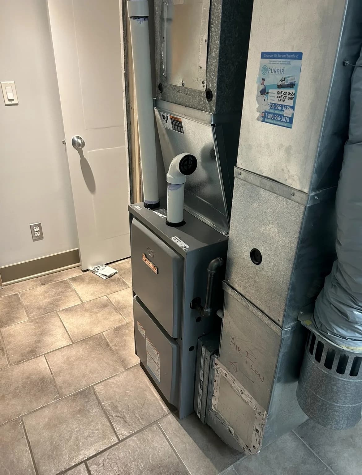 High-efficiency furnace installed in a Calgary mechanical room